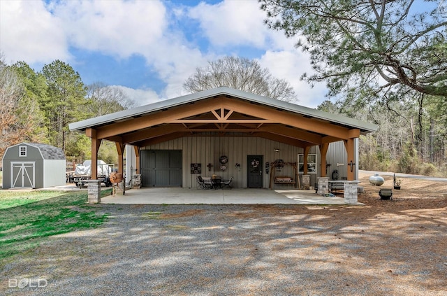 view of shed with a carport