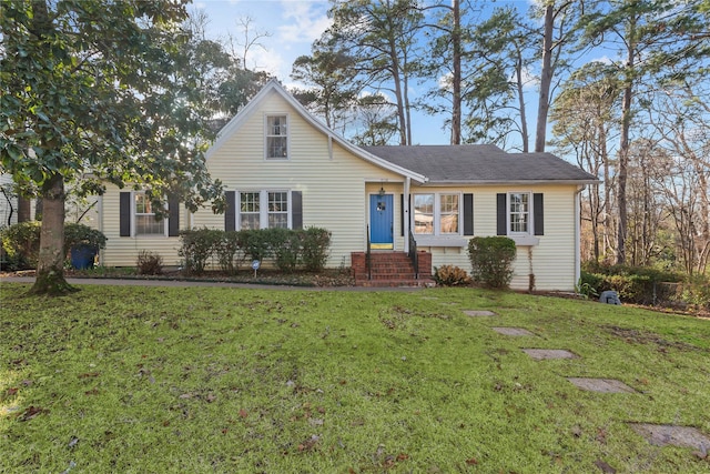 view of front of house with a front lawn