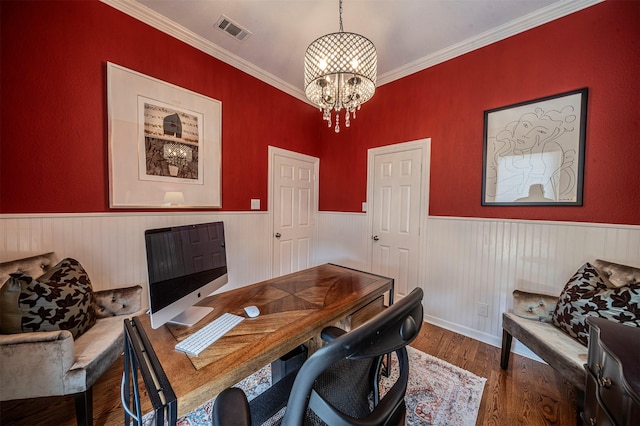 home office featuring a notable chandelier, visible vents, wood finished floors, and wainscoting