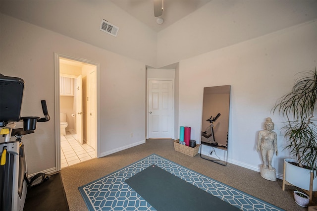 workout room with ceiling fan, carpet floors, visible vents, and baseboards