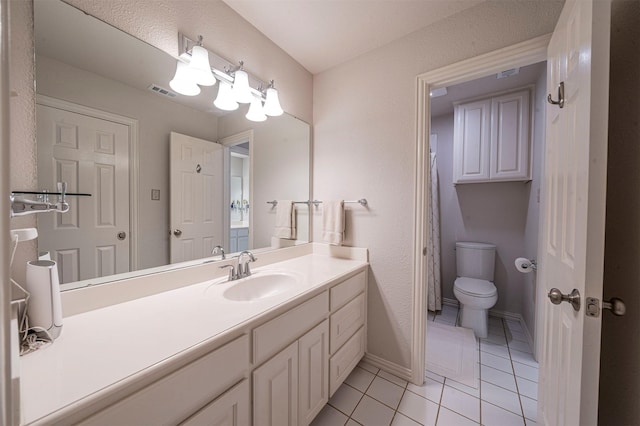 full bathroom with visible vents, toilet, vanity, tile patterned flooring, and baseboards