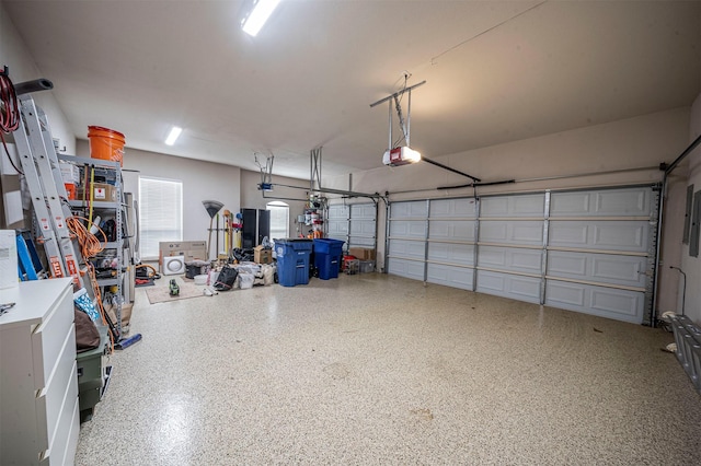 garage featuring a garage door opener