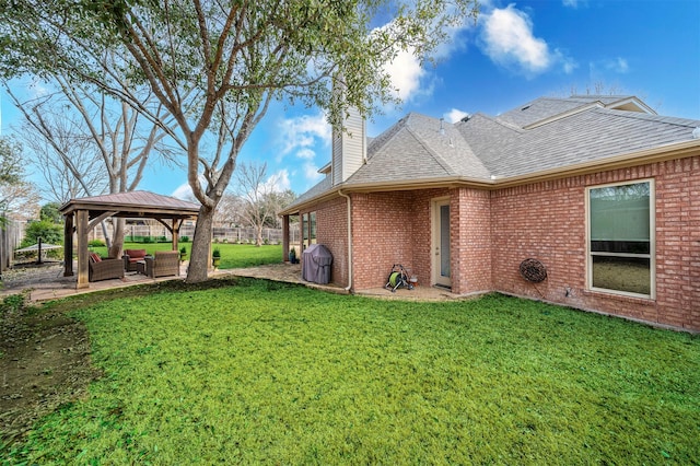 exterior space featuring a gazebo, a patio, outdoor lounge area, and fence