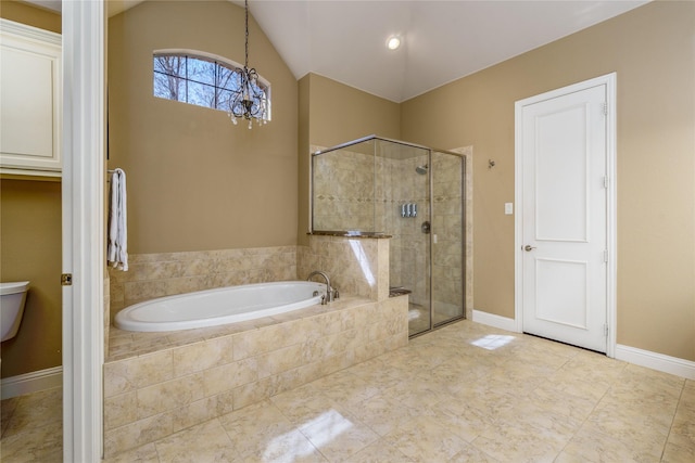 full bathroom featuring a shower stall, baseboards, lofted ceiling, an inviting chandelier, and a bath