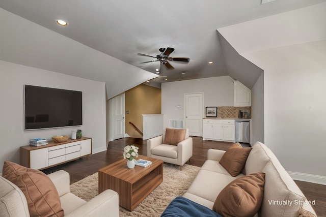 living area featuring visible vents, recessed lighting, baseboards, dark wood-style flooring, and vaulted ceiling