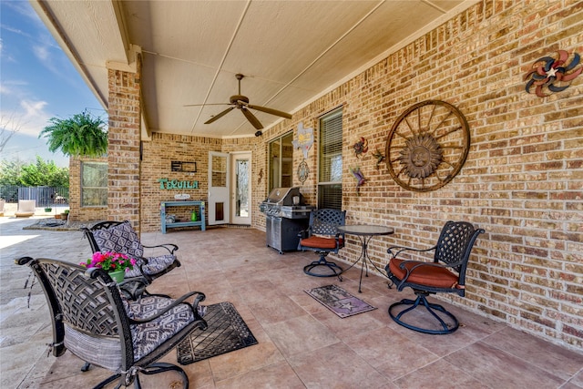 view of patio / terrace featuring grilling area and ceiling fan