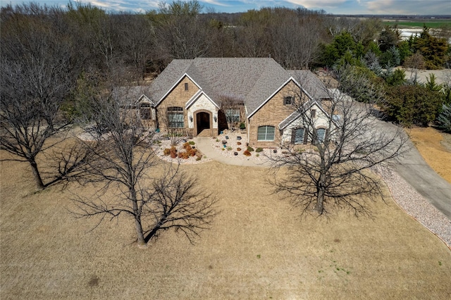 view of front of home featuring stone siding