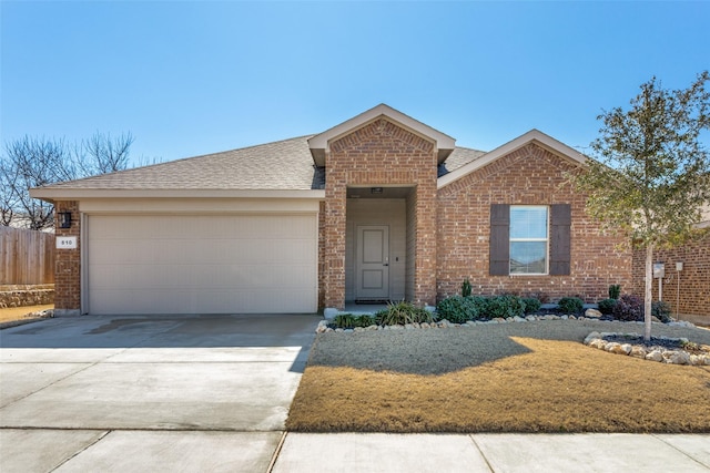 single story home featuring an attached garage, driveway, a shingled roof, and brick siding