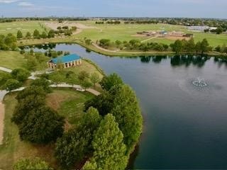 aerial view featuring a water view and a rural view