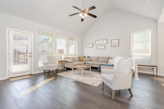 living room featuring dark wood finished floors, visible vents, a ceiling fan, high vaulted ceiling, and baseboards