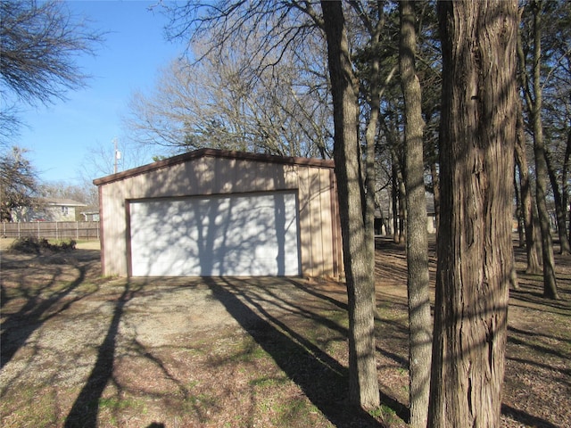 garage featuring fence