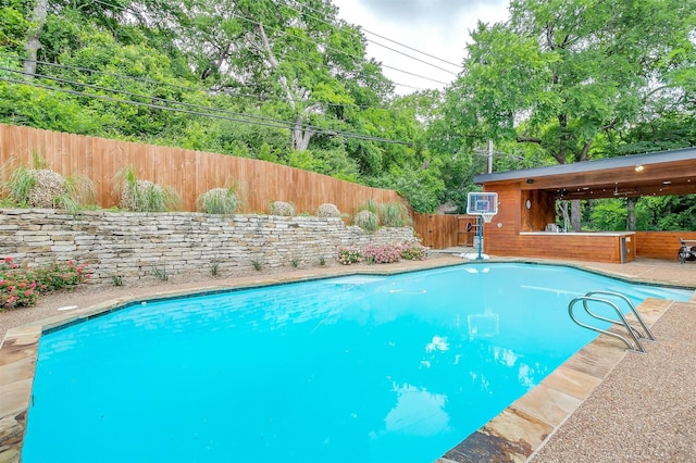 view of pool featuring a fenced backyard