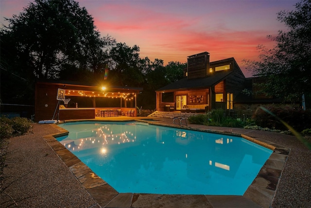 pool with a patio