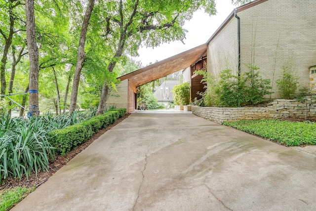 exterior space with concrete driveway