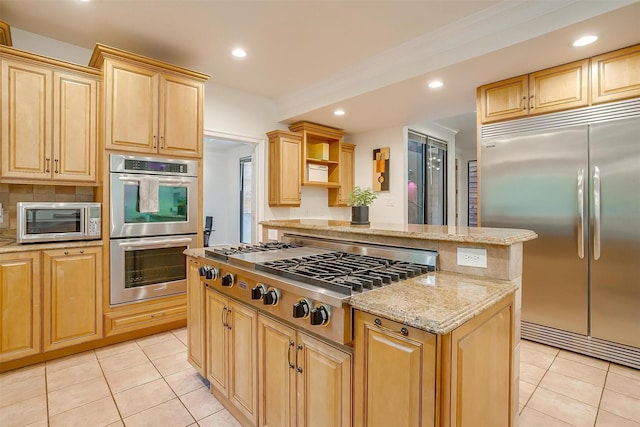 kitchen with stainless steel appliances, light tile patterned flooring, open shelves, and light brown cabinetry