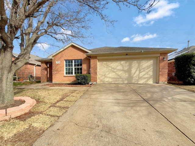 ranch-style house with brick siding, driveway, an attached garage, and roof with shingles