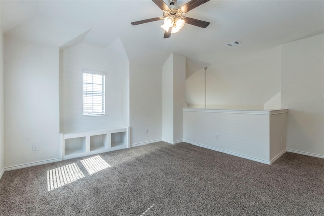 bonus room with lofted ceiling, carpet, visible vents, and baseboards