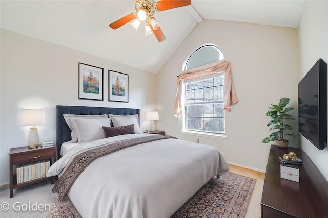 bedroom featuring lofted ceiling, ceiling fan, and baseboards