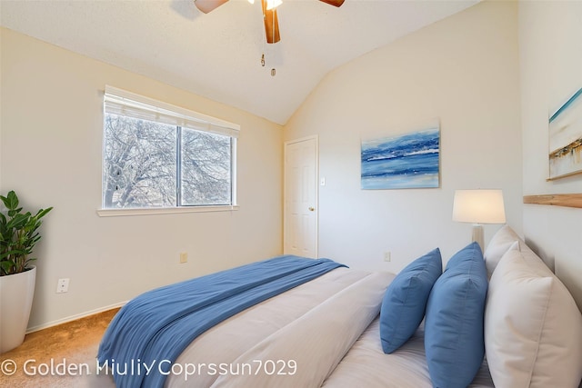 bedroom with vaulted ceiling, baseboards, a ceiling fan, and light colored carpet