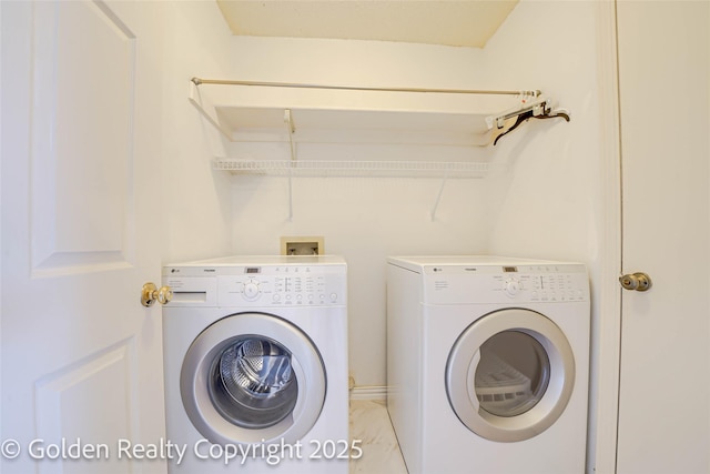 laundry room featuring laundry area and independent washer and dryer