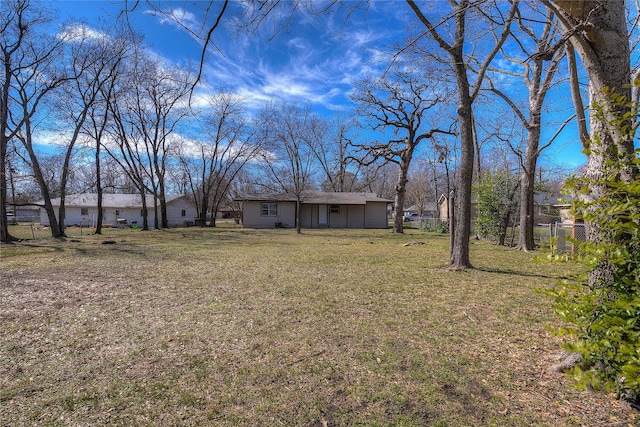 view of yard featuring fence