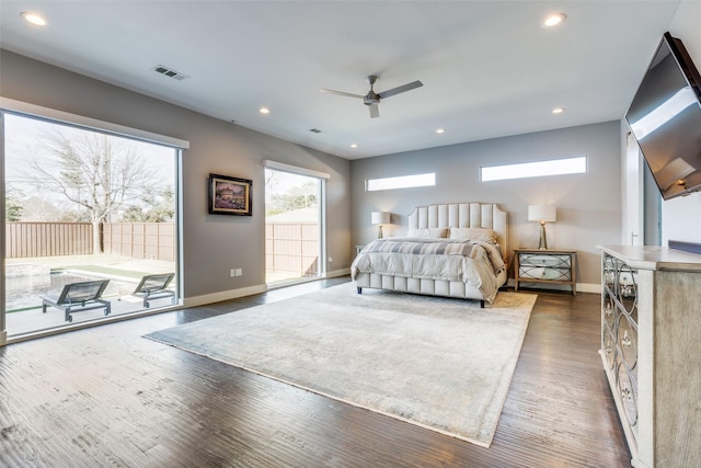 bedroom with access to outside, visible vents, dark wood-style flooring, and recessed lighting