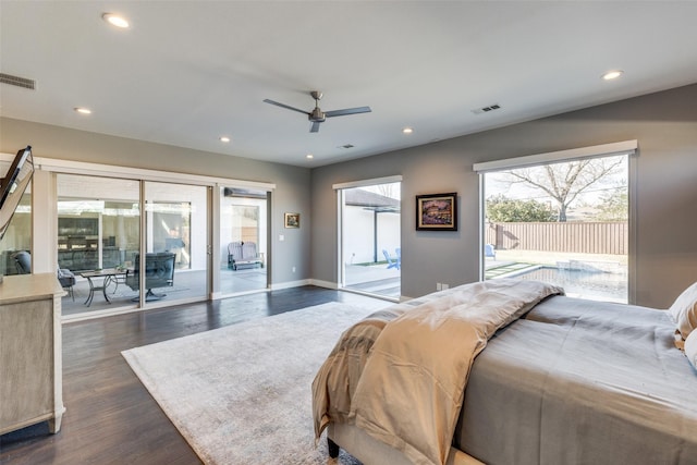 bedroom with access to outside, dark wood-style flooring, visible vents, and recessed lighting