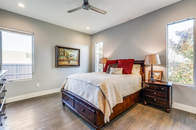 bedroom with ceiling fan, recessed lighting, dark wood finished floors, and baseboards