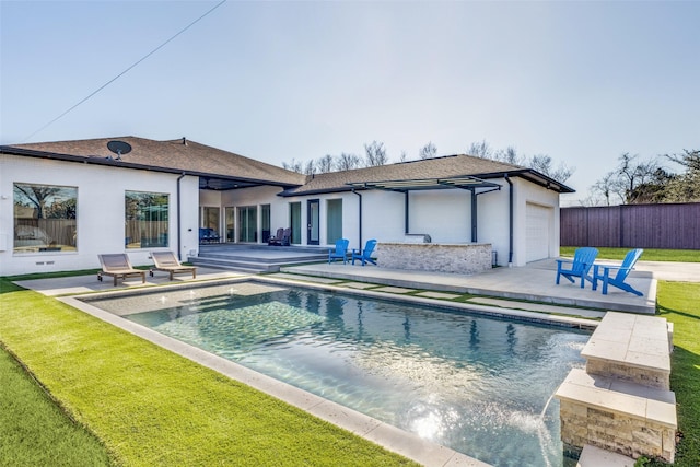 view of swimming pool with a fenced in pool, a patio area, fence, and a lawn