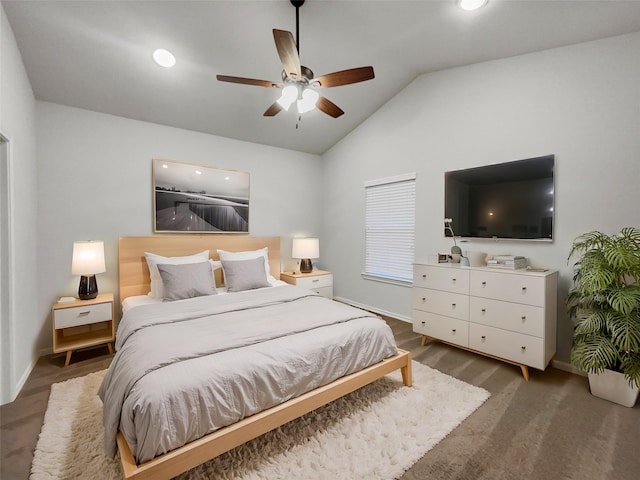 bedroom with ceiling fan, baseboards, and vaulted ceiling