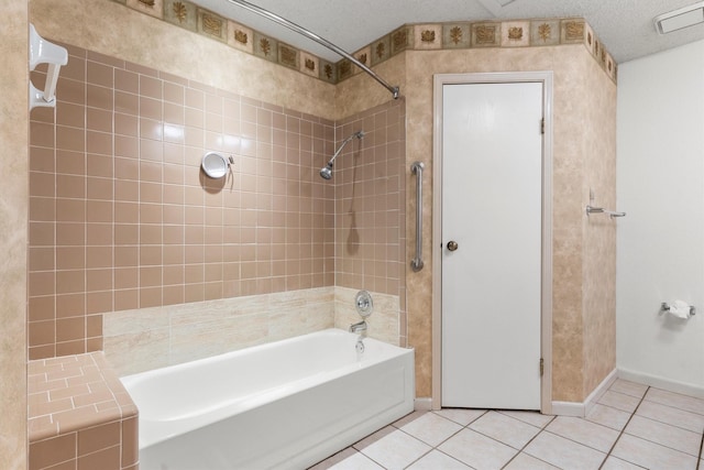 bathroom featuring visible vents, a textured ceiling, shower / tub combination, tile patterned flooring, and baseboards