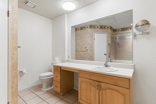 full bathroom with tile patterned flooring, visible vents, toilet, a tile shower, and a textured ceiling