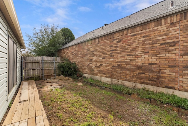 view of yard featuring fence