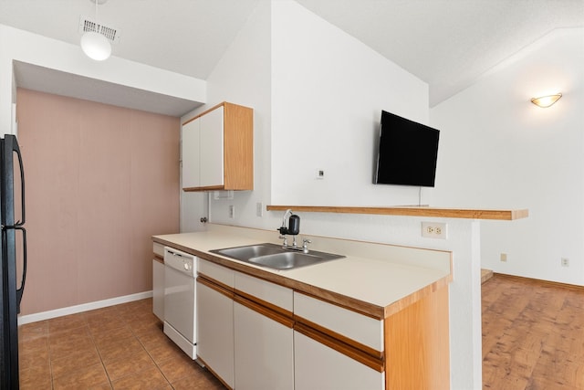 kitchen with visible vents, a sink, white cabinets, light countertops, and dishwasher