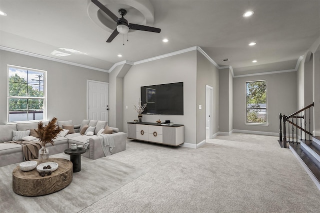 living room with recessed lighting, stairs, baseboards, and light colored carpet