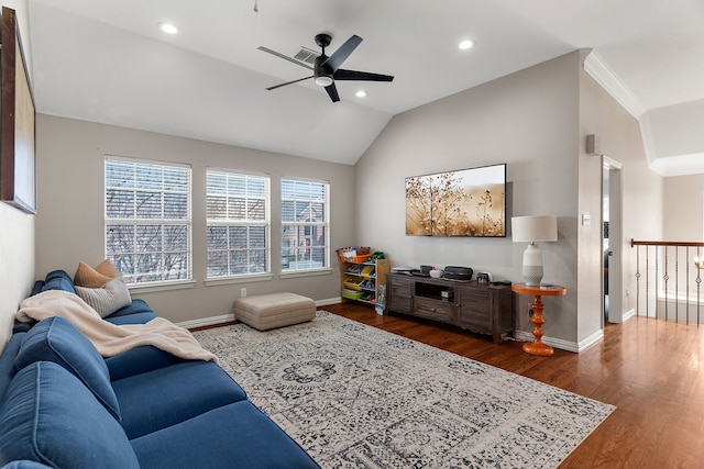 living area with lofted ceiling, recessed lighting, dark wood finished floors, and baseboards