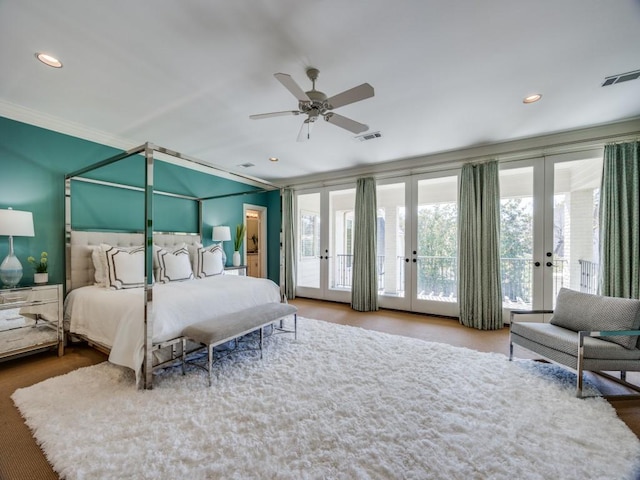 bedroom featuring access to outside, visible vents, ornamental molding, and french doors