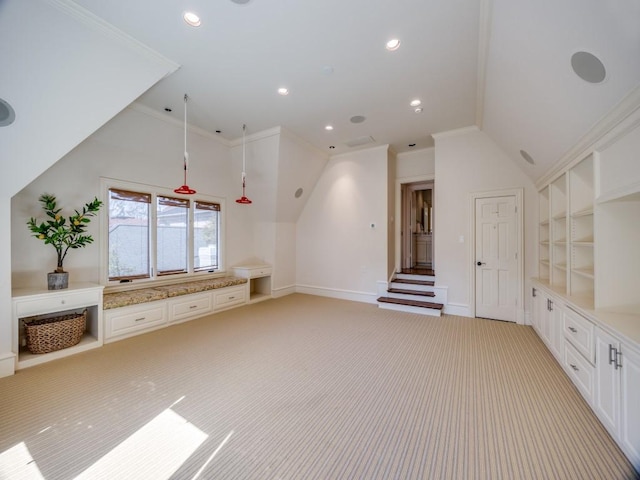 interior space featuring lofted ceiling, recessed lighting, baseboards, and light colored carpet