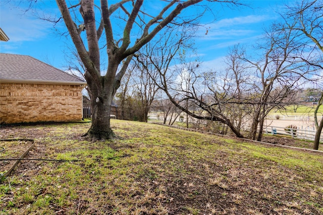 view of yard with fence