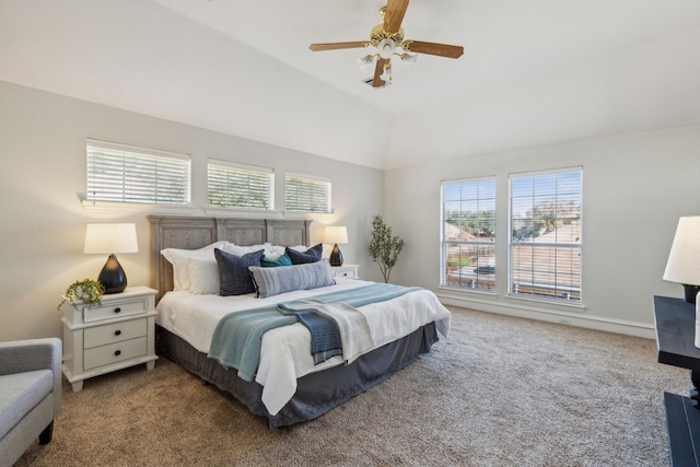 bedroom with lofted ceiling, carpet floors, a ceiling fan, and baseboards