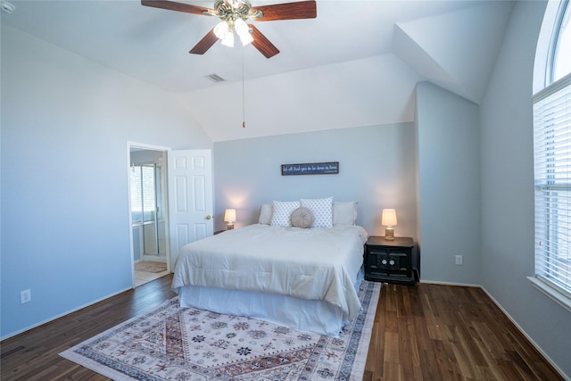 bedroom with lofted ceiling, visible vents, dark wood-type flooring, a ceiling fan, and baseboards