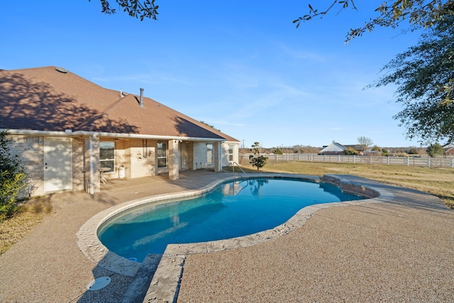 view of swimming pool with a patio, fence, and a fenced in pool