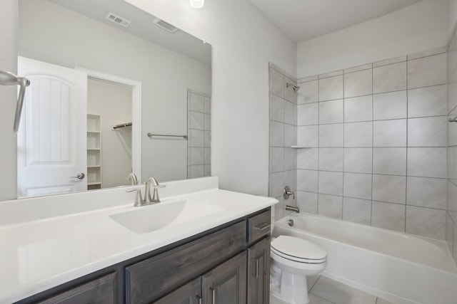 bathroom with shower / bathtub combination, toilet, vanity, and visible vents