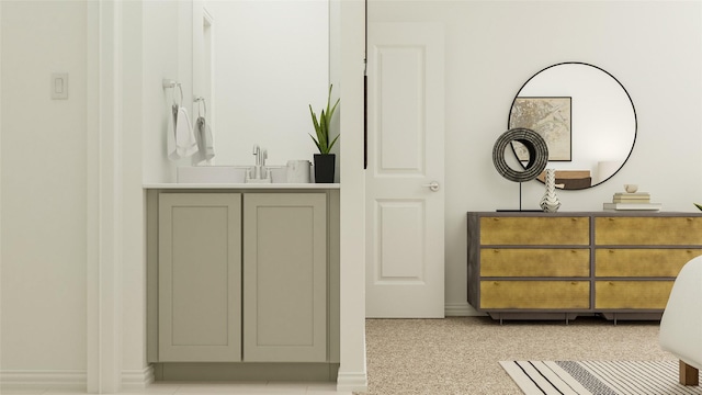 bathroom featuring a closet and vanity