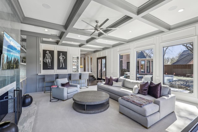 interior space with a premium fireplace, coffered ceiling, beam ceiling, and recessed lighting