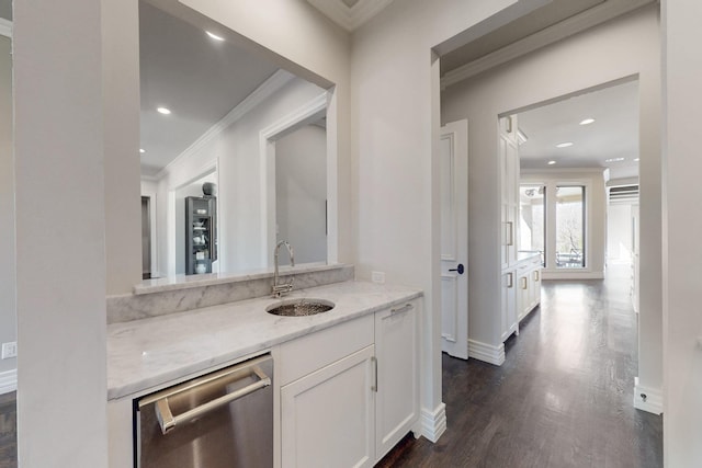 bar featuring recessed lighting, dark wood-style flooring, a sink, ornamental molding, and dishwasher