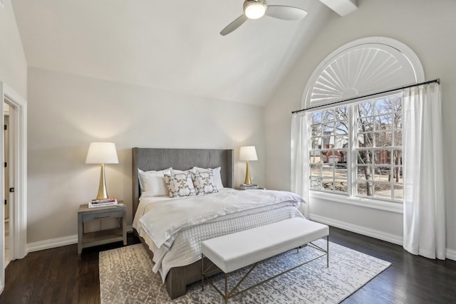 bedroom with lofted ceiling, ceiling fan, baseboards, and wood finished floors