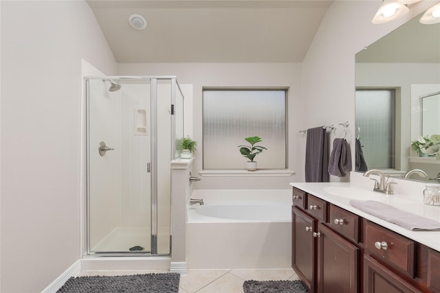 1805 Ringtail Dr, Little Elm, TX 75068 - bathroom with a stall shower, tile patterned floors, vanity, and a bath