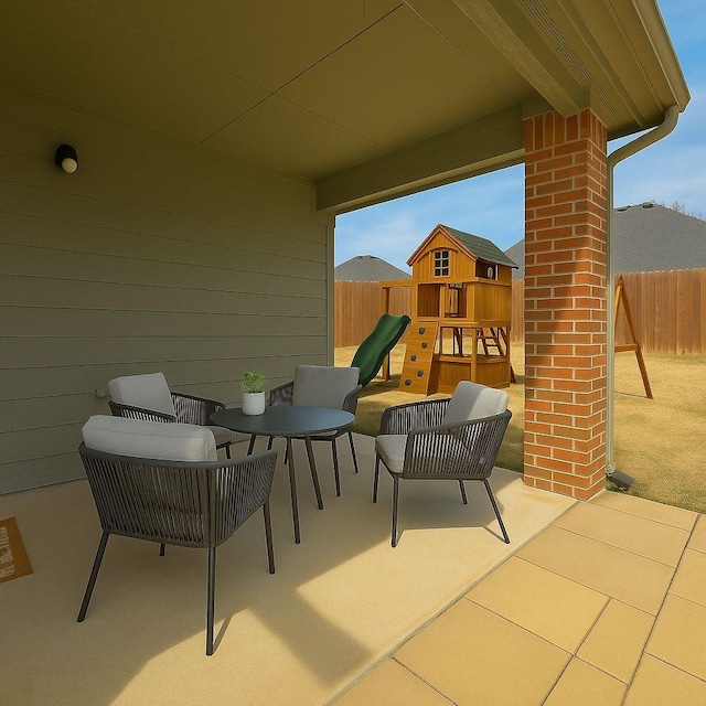 1805 Ringtail Dr, Little Elm, TX 75068 - view of patio featuring a playground and fence