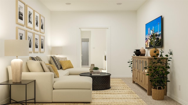 living room featuring light carpet and baseboards